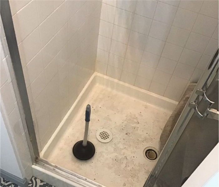 shower with dirty water