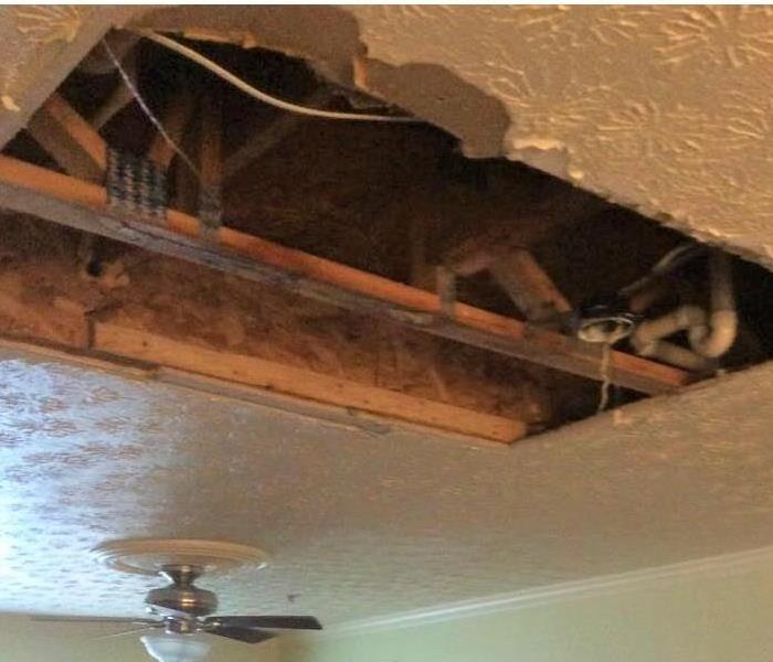 water damage on living room ceiling